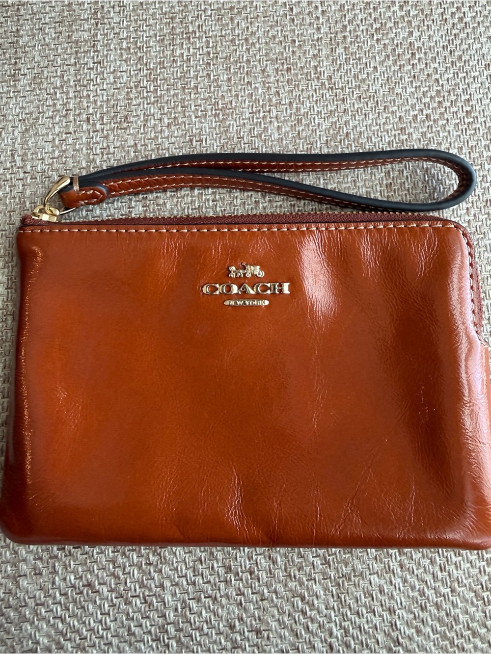 Coach cinnamon Leather Wristlet with Gold Hardware